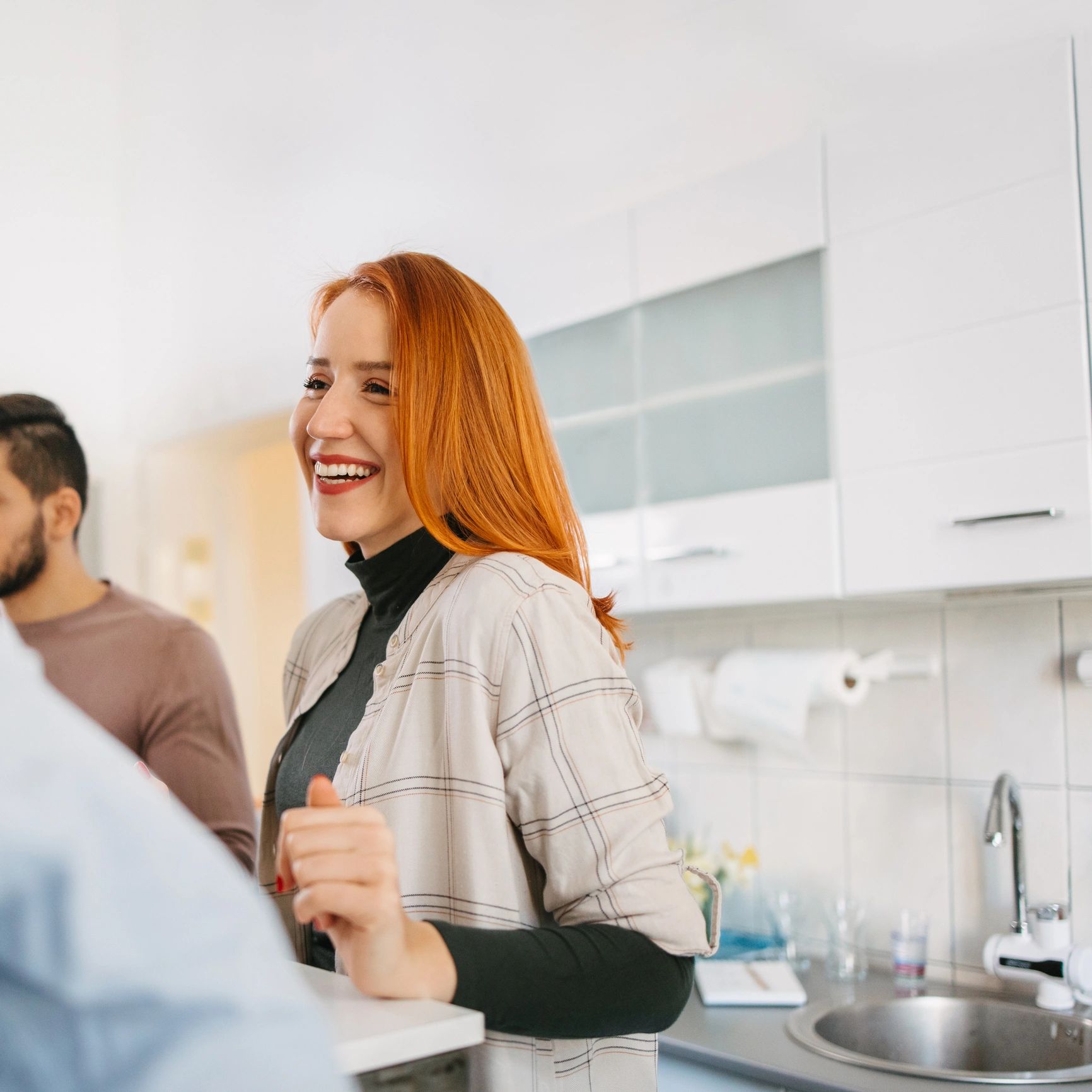 Smiling customer in kitchen